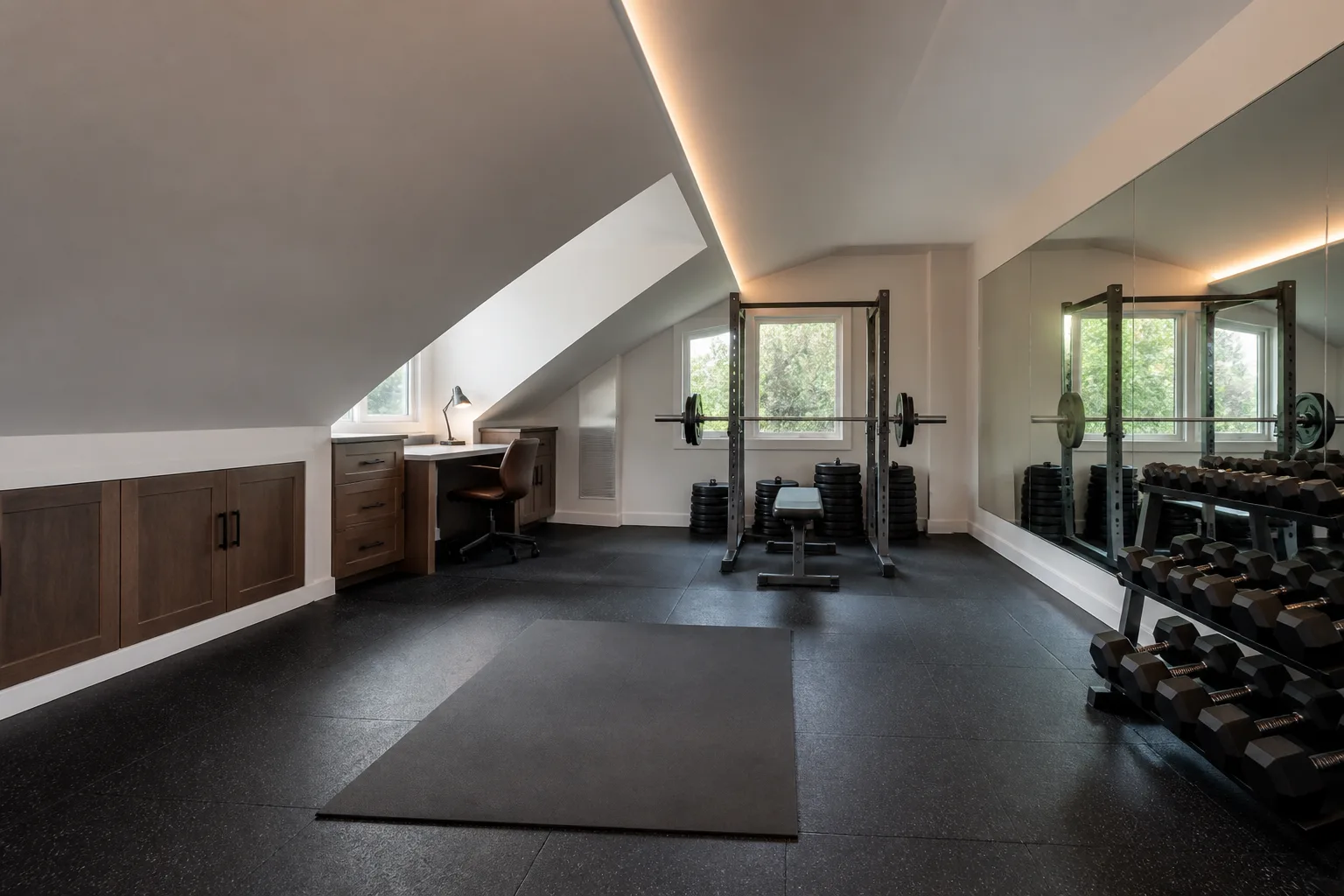 A sloped-ceiling home gym, designed for it